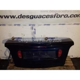 Portón trasero Renault Megane I Coupé. azul (1997. con aleron. tercera luz de freno y pilotos)