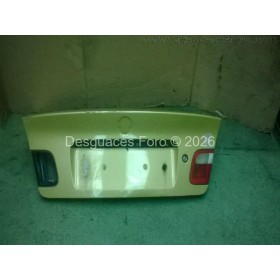 Portón trasero BMW E46 amarillo.