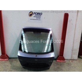 Portón trasero Opel Astra G gris azulado.